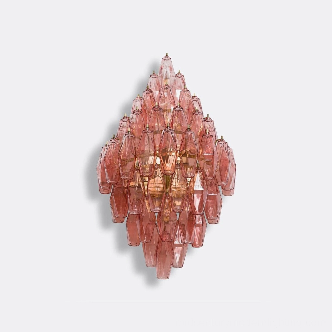 Polyhedral glass wall sconce showing size comparison and scale of geometric design