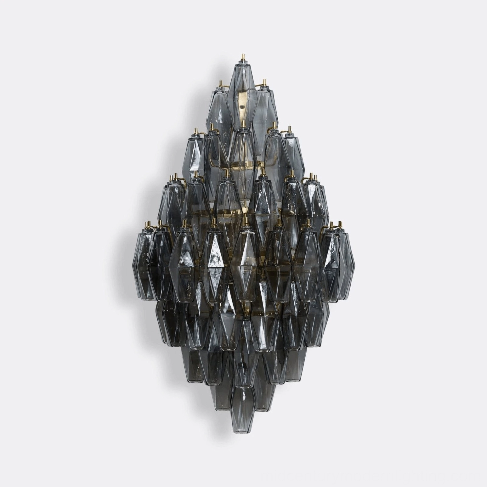 Biscayne polyhedral glass wall sconce frontal studio view showing complete faceted layered structure in smoky grey