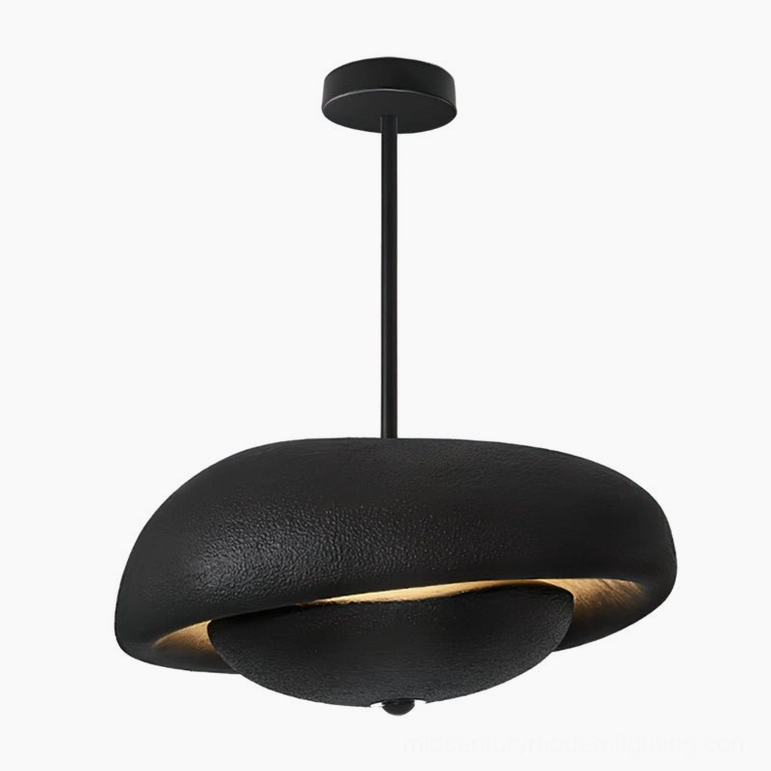 Black matte resin pendant lamp with organic sculptural form and dynamic shadow-casting design