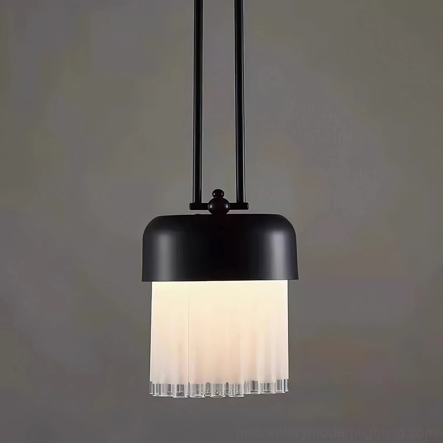 Black pendant light fixture showcasing ribbed frosted glass diffuser and precision metal craftsmanship