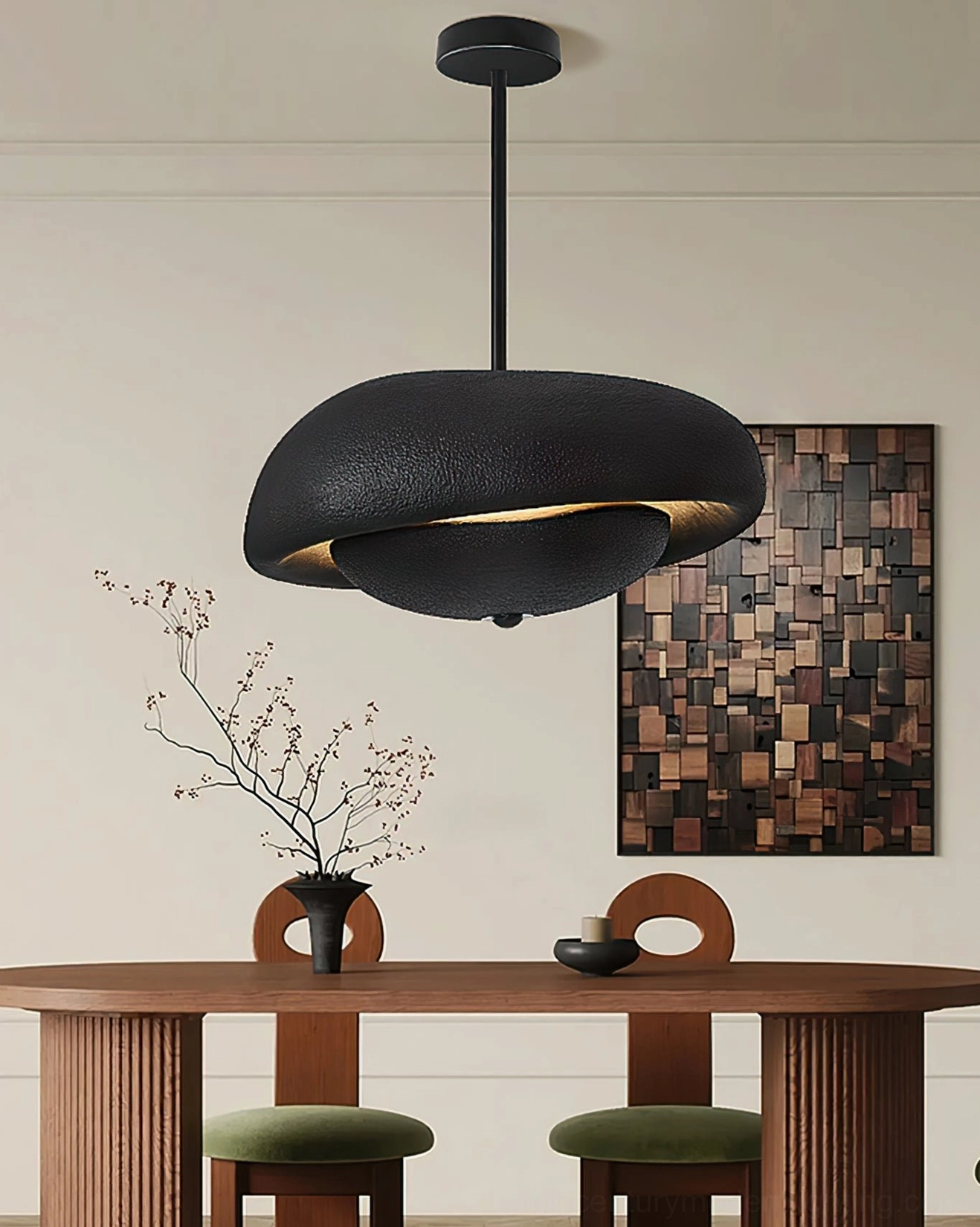 Matte black textured resin pendant light with three-quarter front view and warm accent lighting