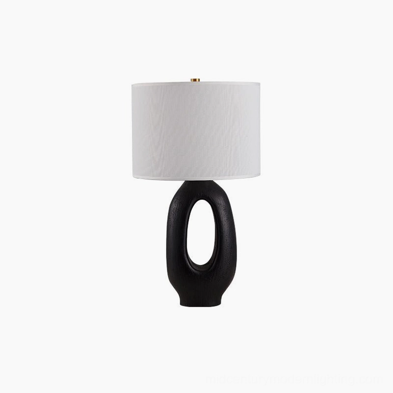 Black and White Sauce sculptural table lamp with universal voltage plug options for global use
