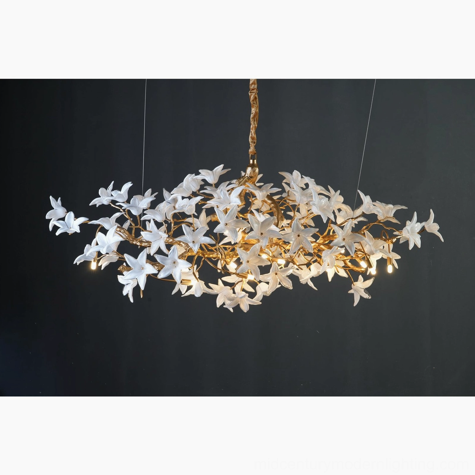 Blossom branch light fixture close-up of brass framework and floral ornament details