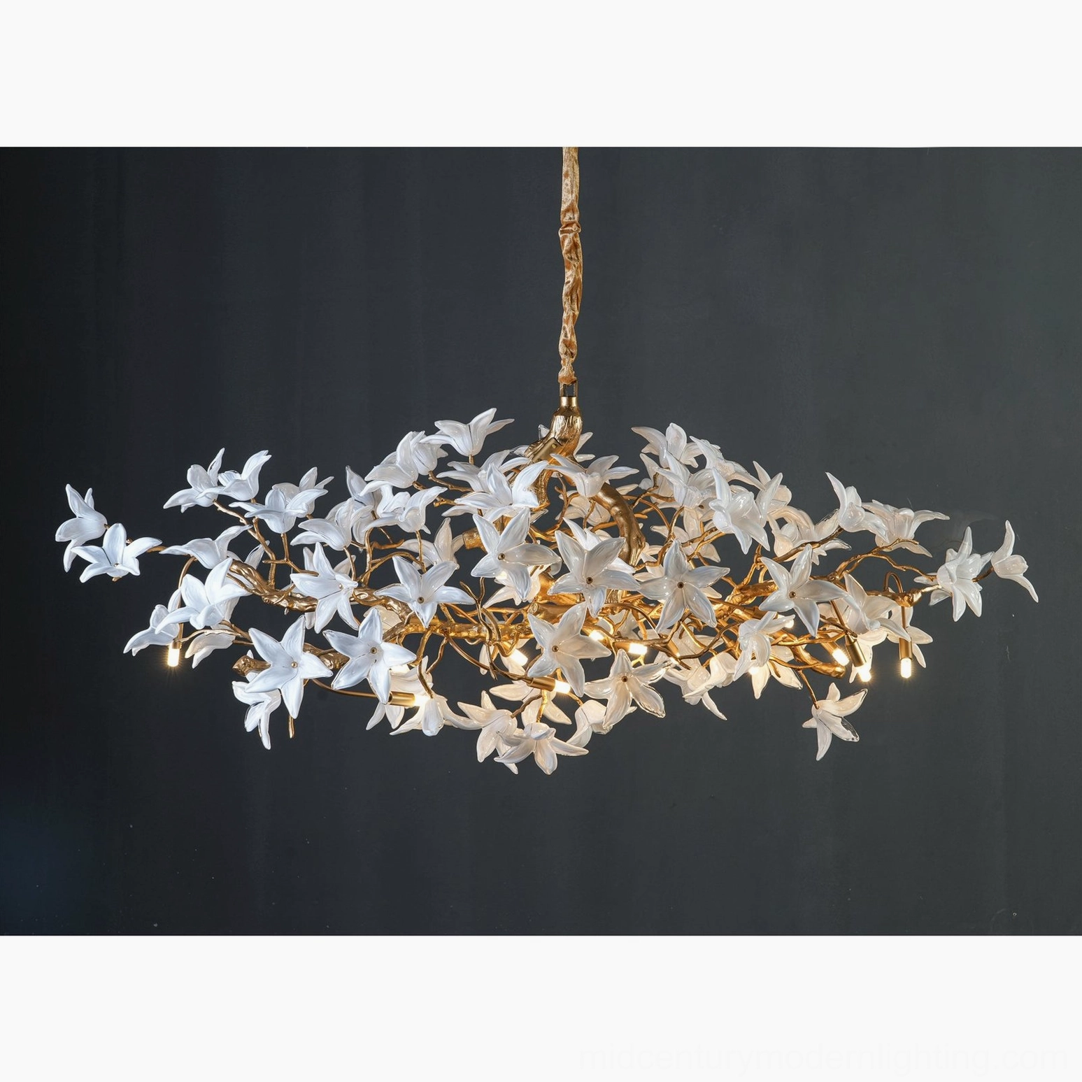 Hand-forged brass blossom branch chandelier sculptural form showcasing nature-inspired organic design