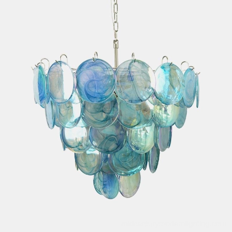 Blue glass disc chandelier with sophisticated tint and stacked conical formation, contemporary home corner interior display