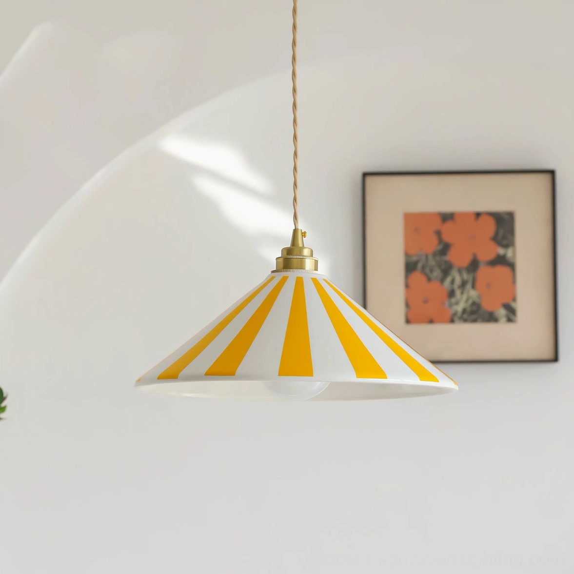 Yellow and white striped Bobine pendant light side perspective with warm glowing light in decorated interior