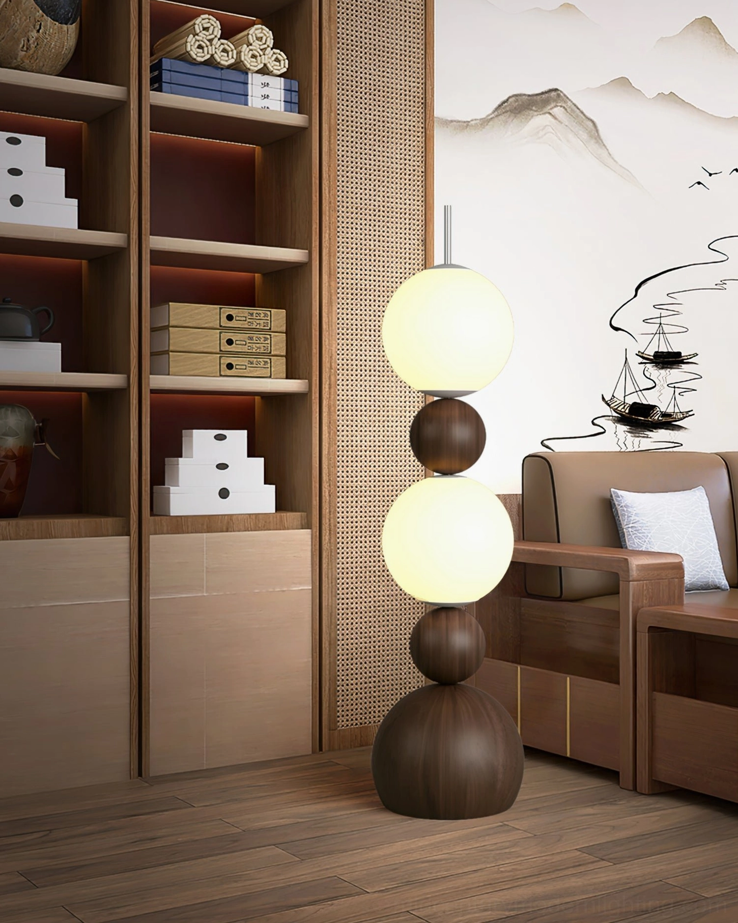 Illuminated Bola floor lamp in study room with bookshelf and oriental landscape wall art mixed minimalist style