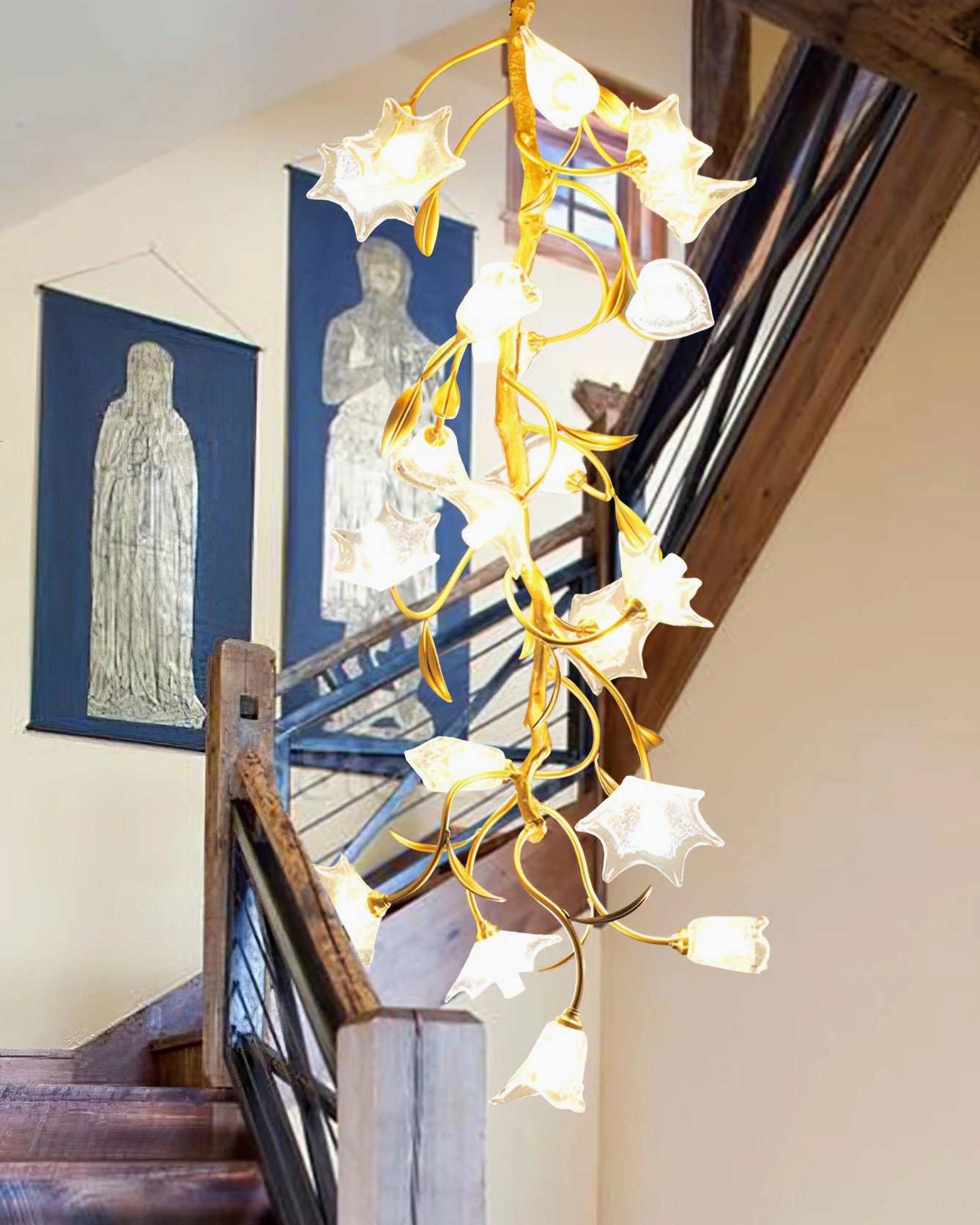 Botanical branch chandelier detail shot showing brass metalwork and delicate glass flower construction