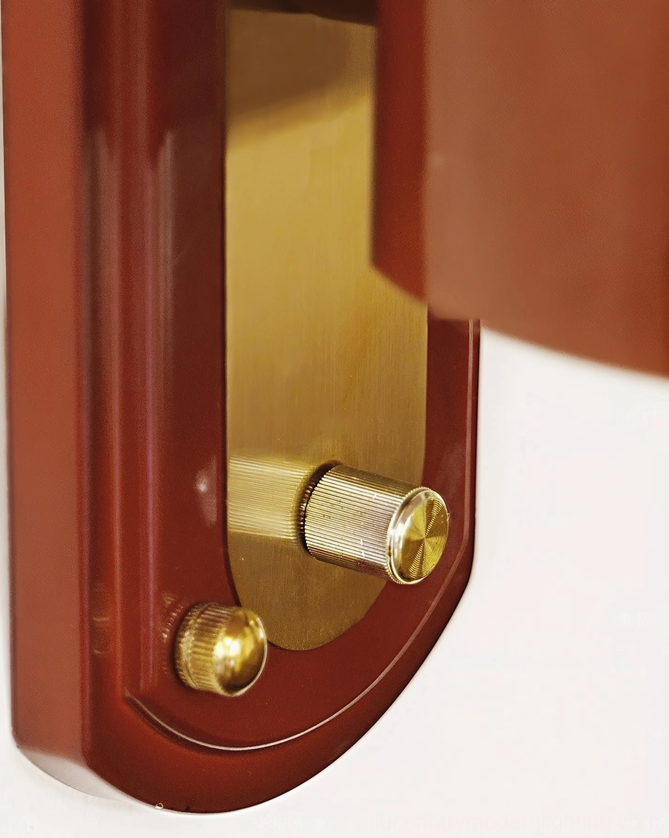 Bradley mid-century wall sconce displaying overall proportions and design with warm amber glass dome and wooden mounting detail