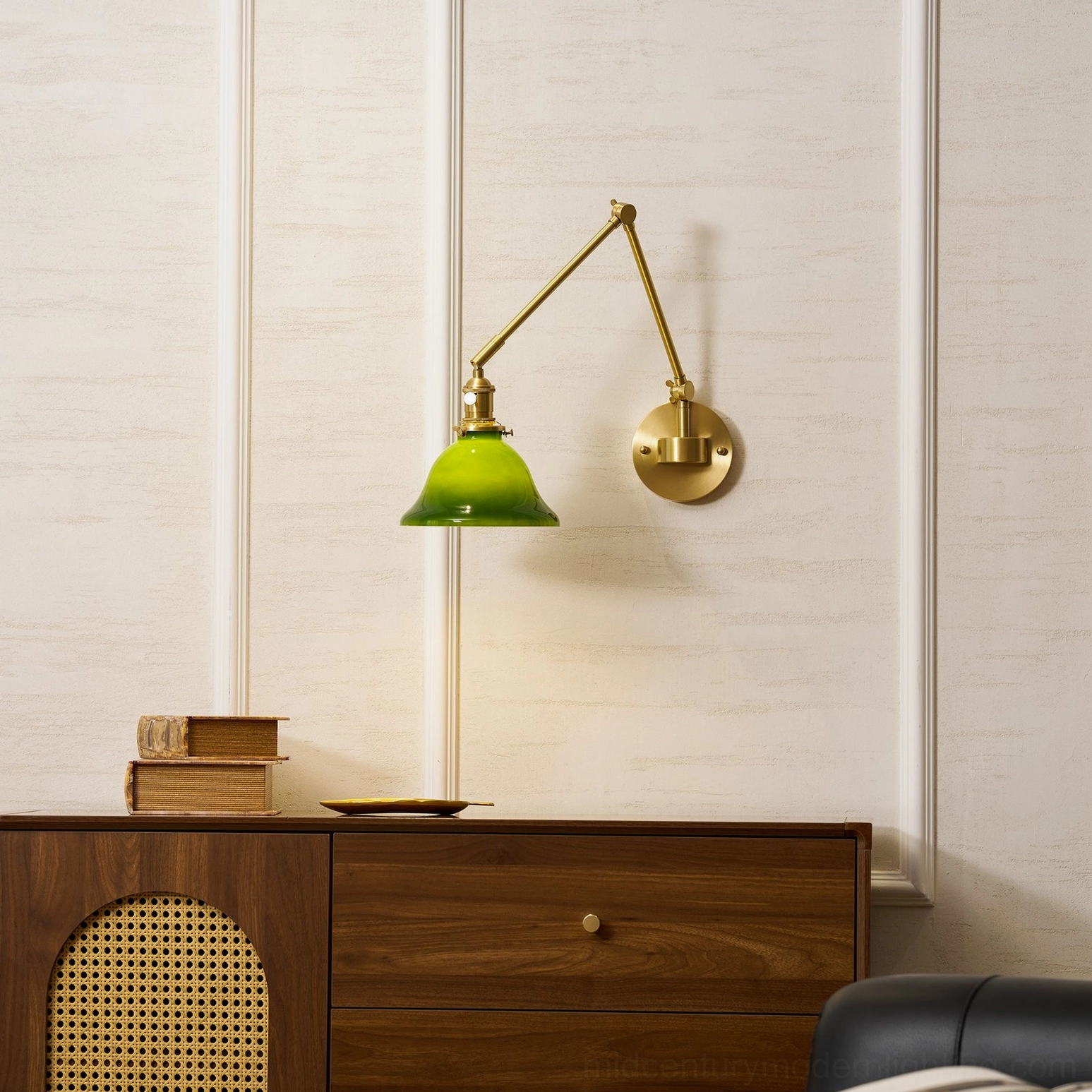 Brady swing arm wall lamp in contemporary interior setting demonstrating design versatility