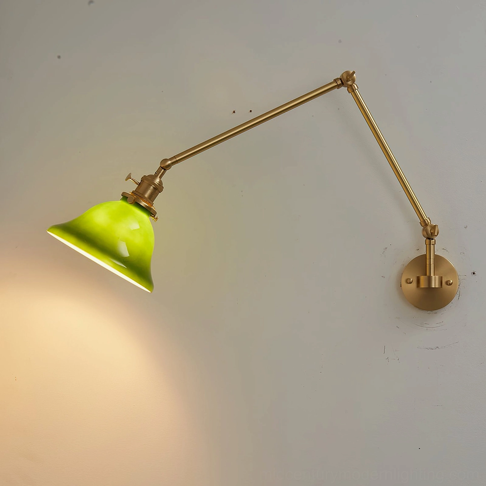 Brady wall lamp brass and green color combination detail against neutral wall background