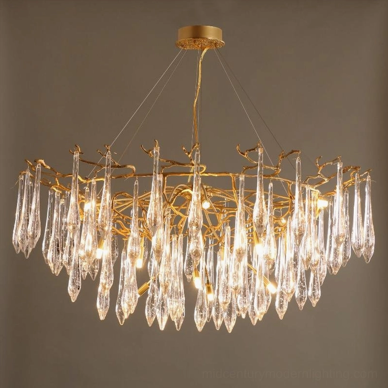 Luxury branch brass chandelier 12 heads with warm glowing illumination mounted on dark gray wall