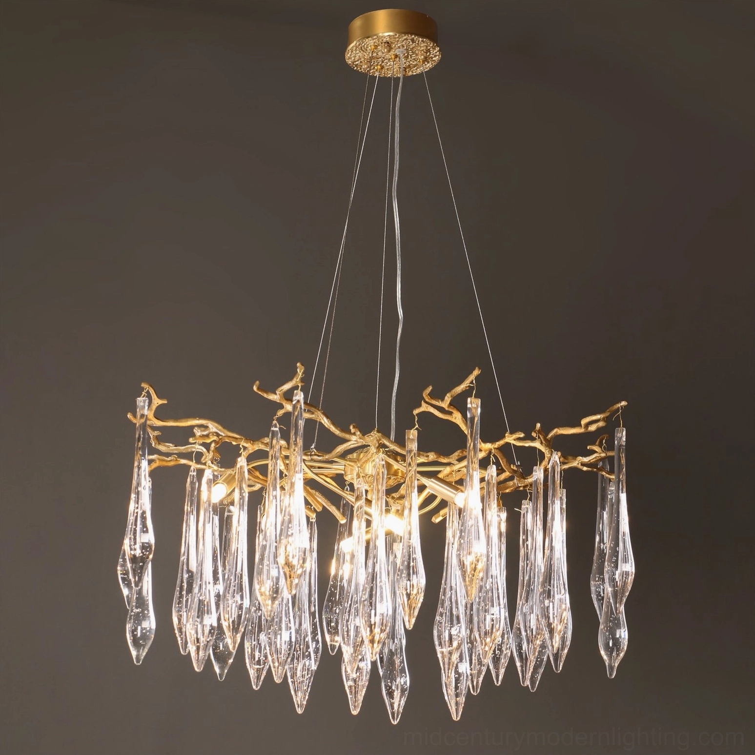 Branch-style crystal chandelier front view unlit clear glass pendants twig metal frame detail