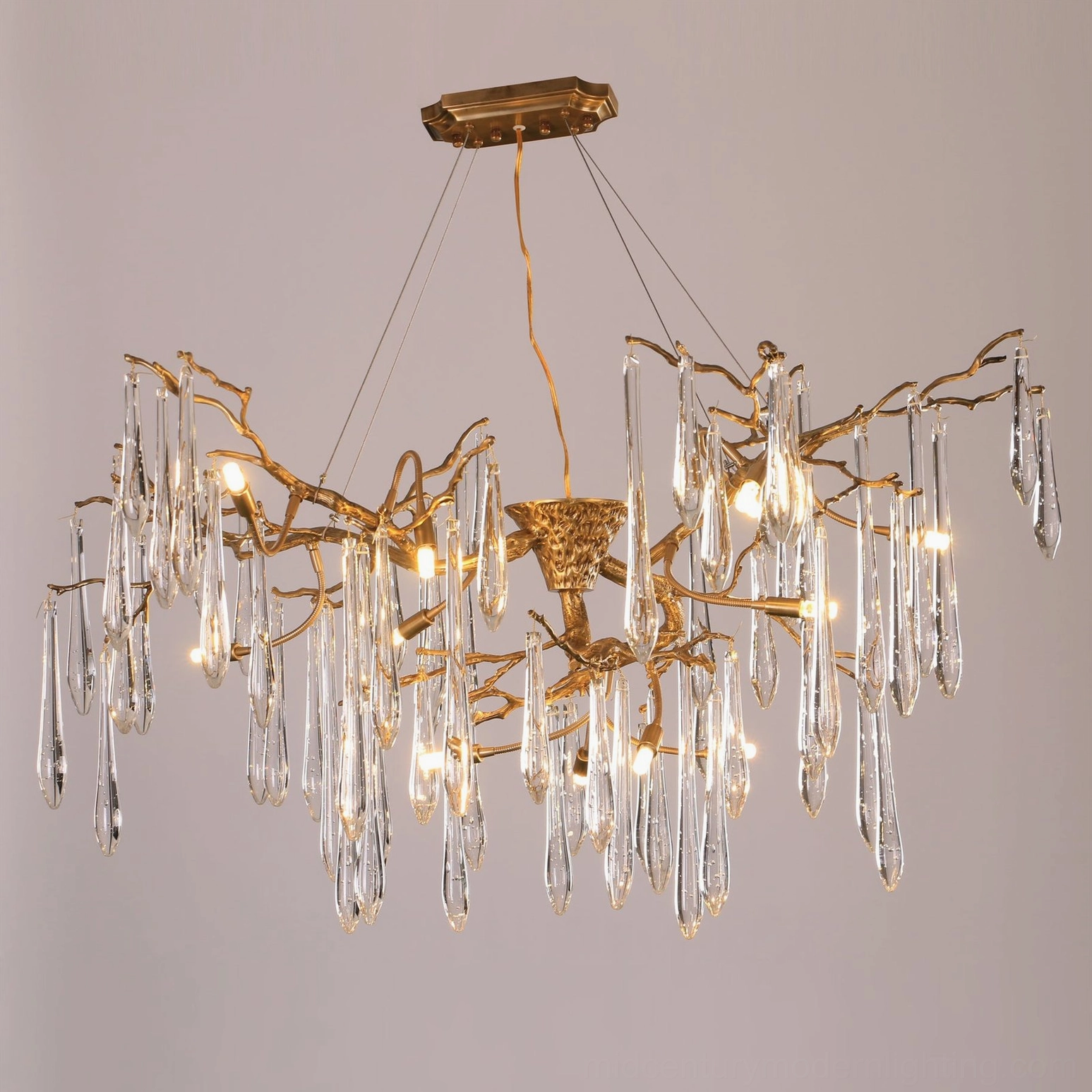 Branch Raindrop Chandelier with symmetrical antique brass branch design and hanging crystal glass droplets, detailed structural view