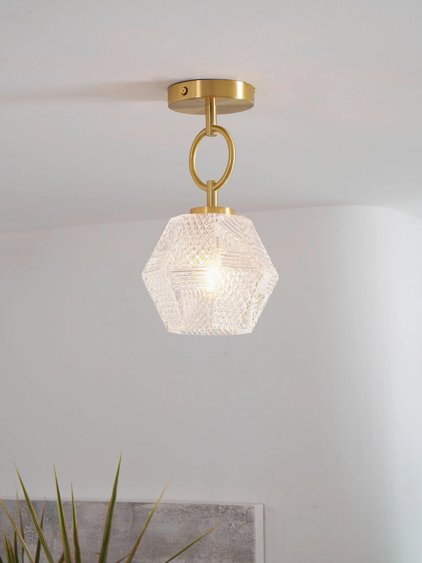 Antique brass Art Deco ceiling light faceted glass refraction pattern detail