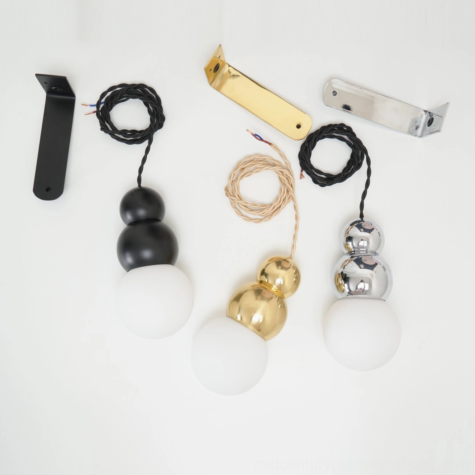 Brass ball wall pendant light fixture, classic mid-century styling, timeless design aesthetic