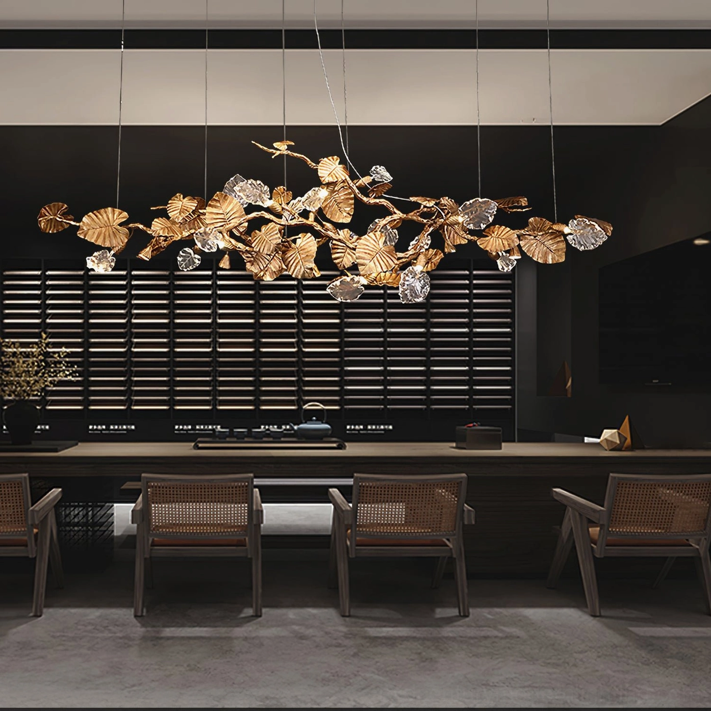 Brass leaf chandelier entryway installation - statement linear pendant light in foyer space