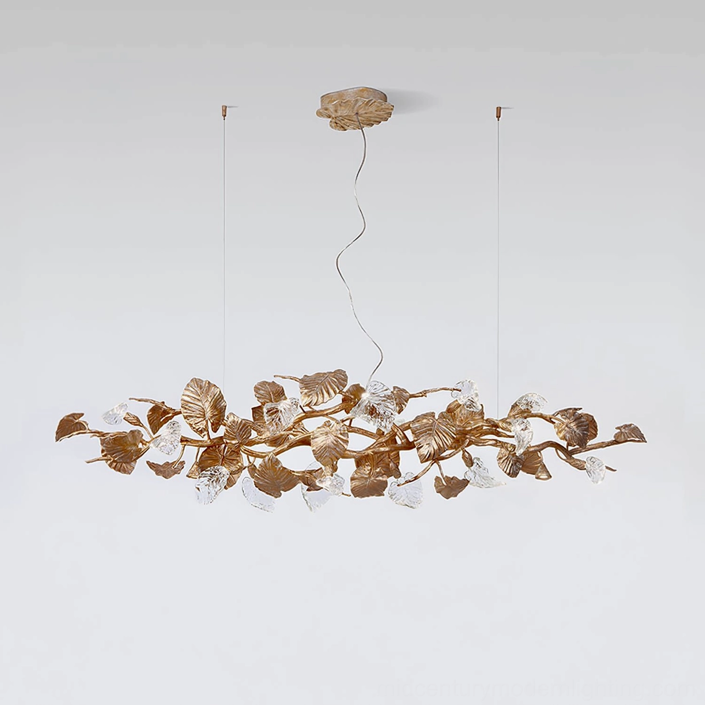 Brass leaf chandelier warm light ambiance - polished brass and glass fixture creating intimate atmosphere
