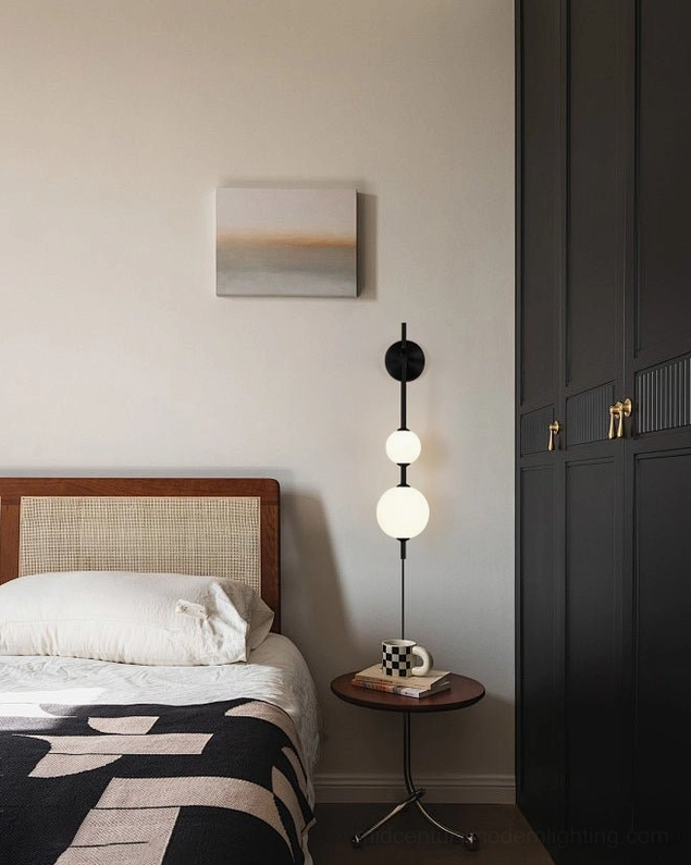 Modern brass vertical globe sconce with clear glass shade option, contemporary design lighting