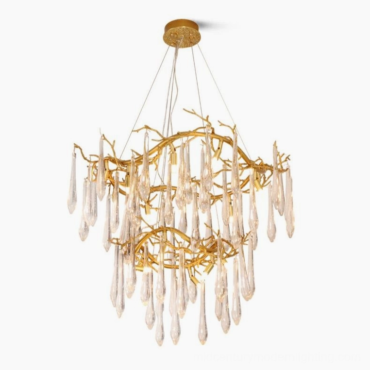 Studio portrait of brass waterfall chandelier with cascading crystal glass droplets, polished gold double-tier design on white background