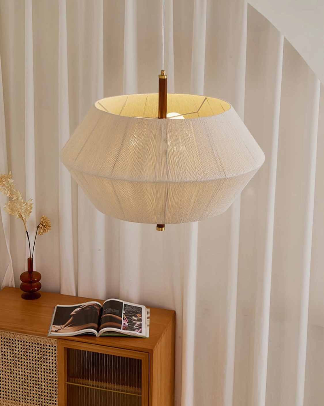 Brera hemp rope pendant light in living room setting paired with mid-century furniture and décor