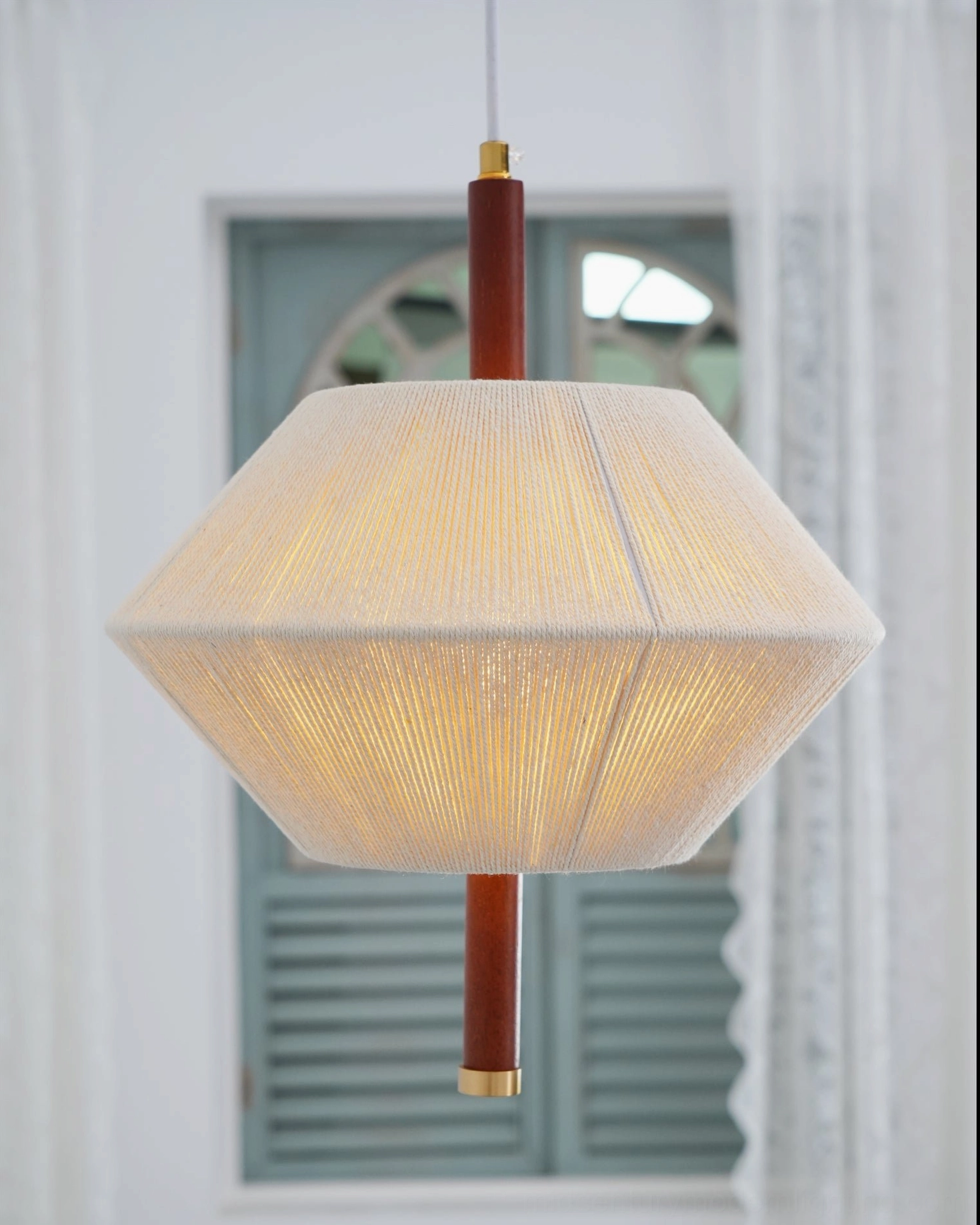 Brera hemp pendant lamp showing organic textile artistry and contemporary geometric design