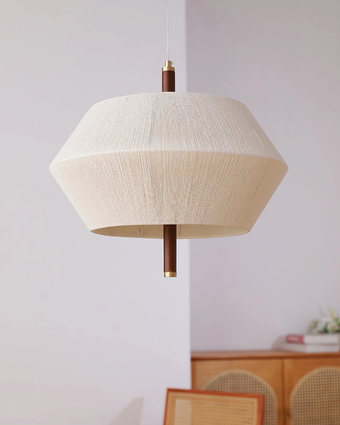 Brera minimalist pendant lamp displaying geometric hexagonal silhouette and woven fabric texture