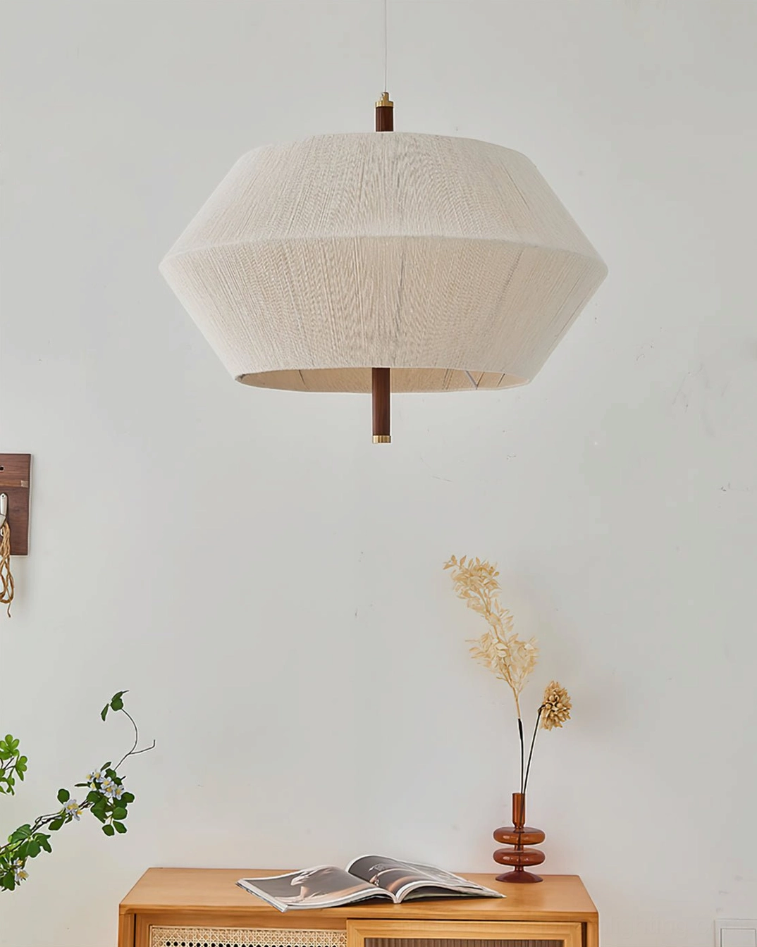 Brera hemp rope pendant lamp in wabi-sabi style interior with vintage wood furniture and minimalist décor