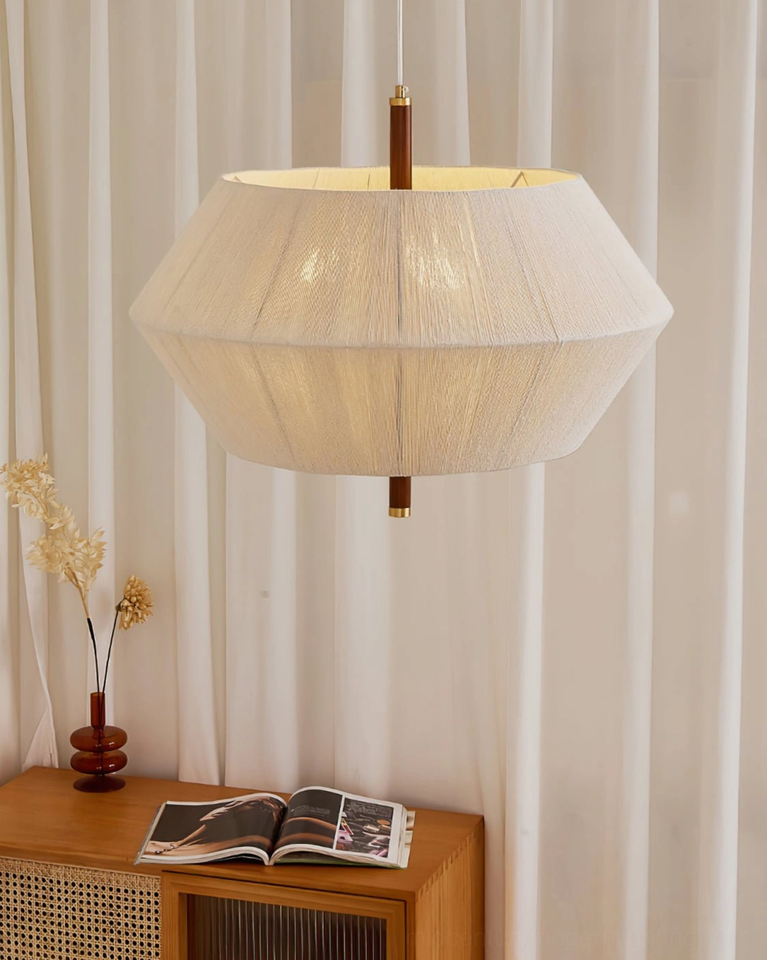 Brera pendant lamp warm light emission through woven hemp rope creating soft diffusion effect