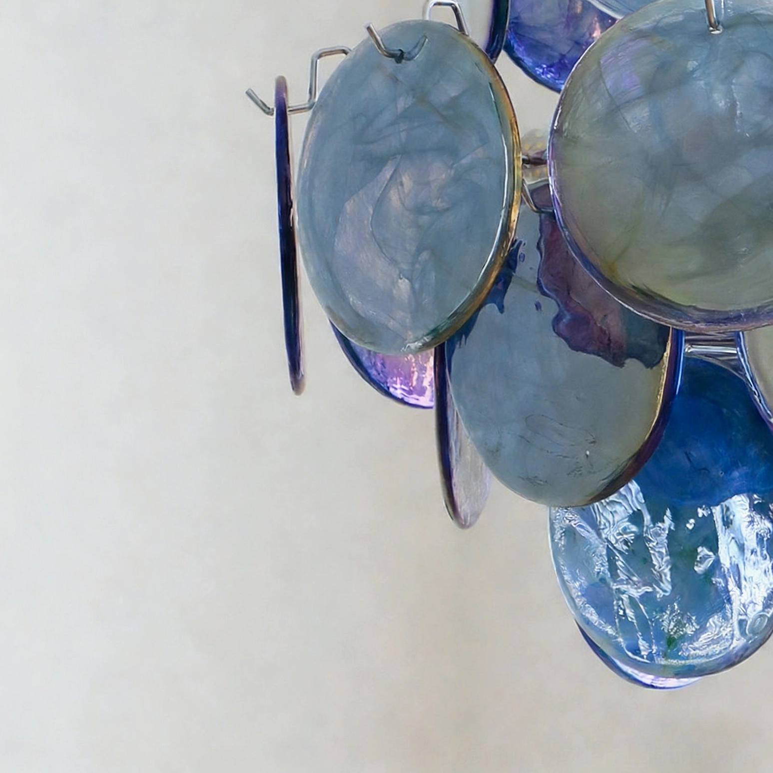 Brette disk glass chandelier white studio product photography showing complete fixture with all glass discs and chrome hardware