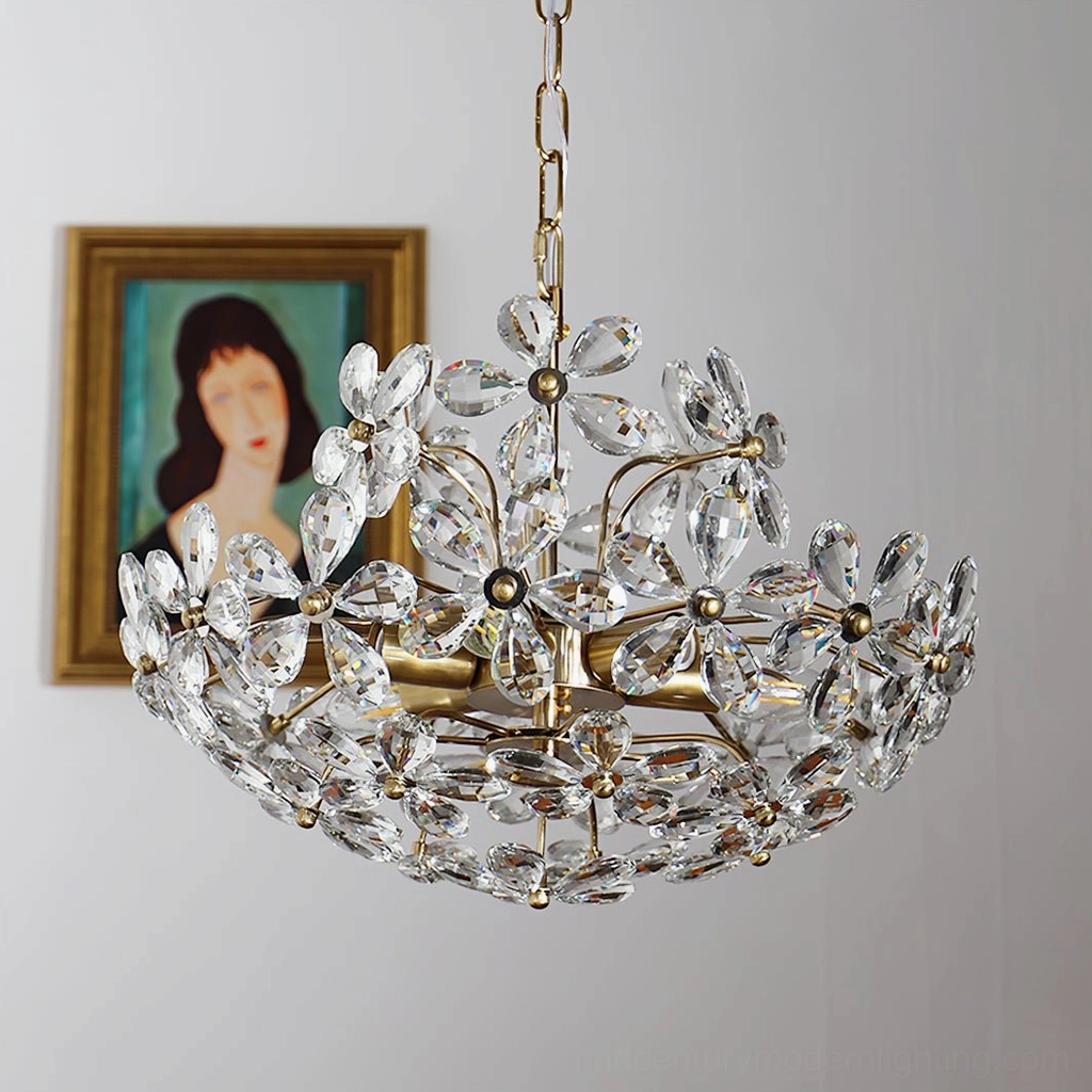 Silver-toned floral crystal chandelier hanging in living room with vintage portrait art and modern romantic luxury style