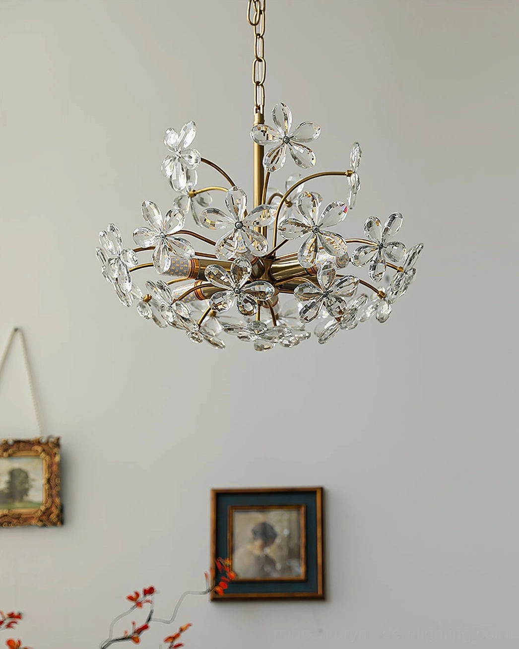 Brielle crystal chandelier installed in formal dining room setting, elegant centerpiece lighting above table