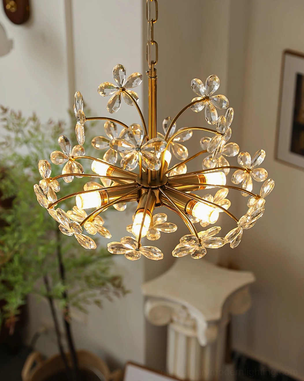 Brielle brass chandelier overhead view showing crystal arrangement pattern and light dispersion capabilities
