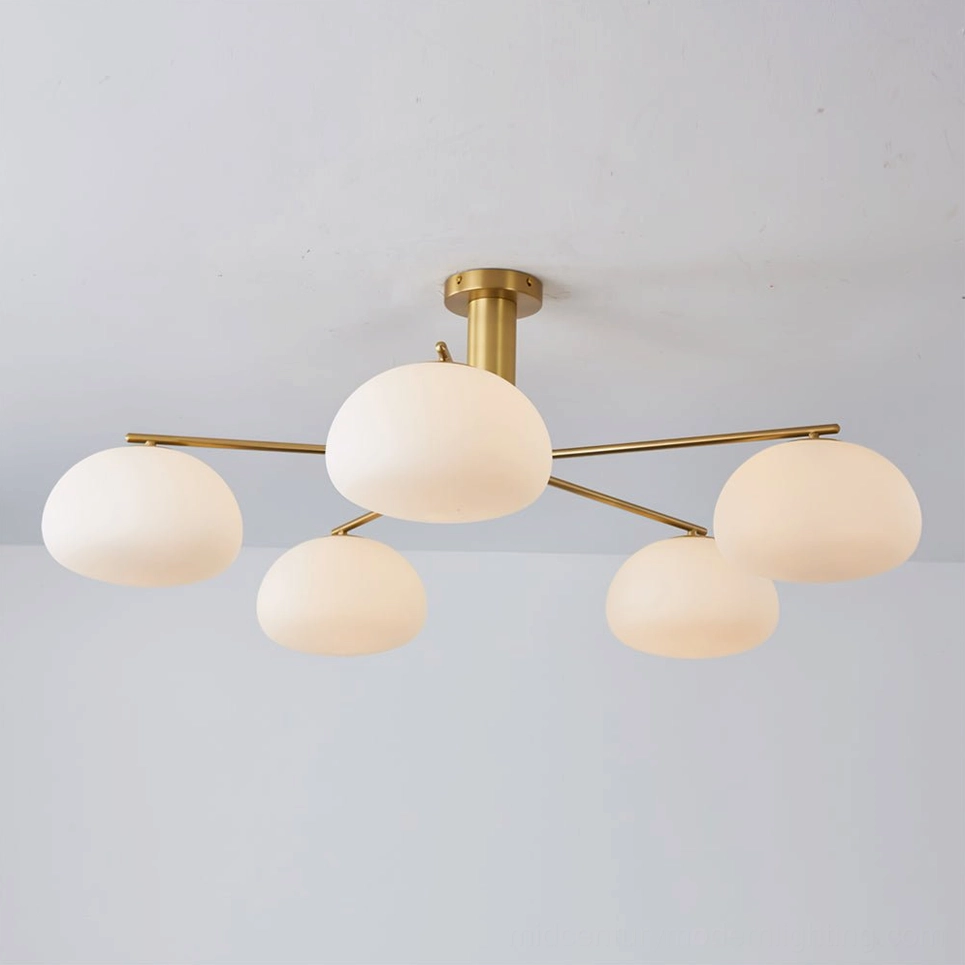 Briette sputnik flush mount ceiling fixture installed in modern residential interior showing warm ambient lighting from opal glass shades