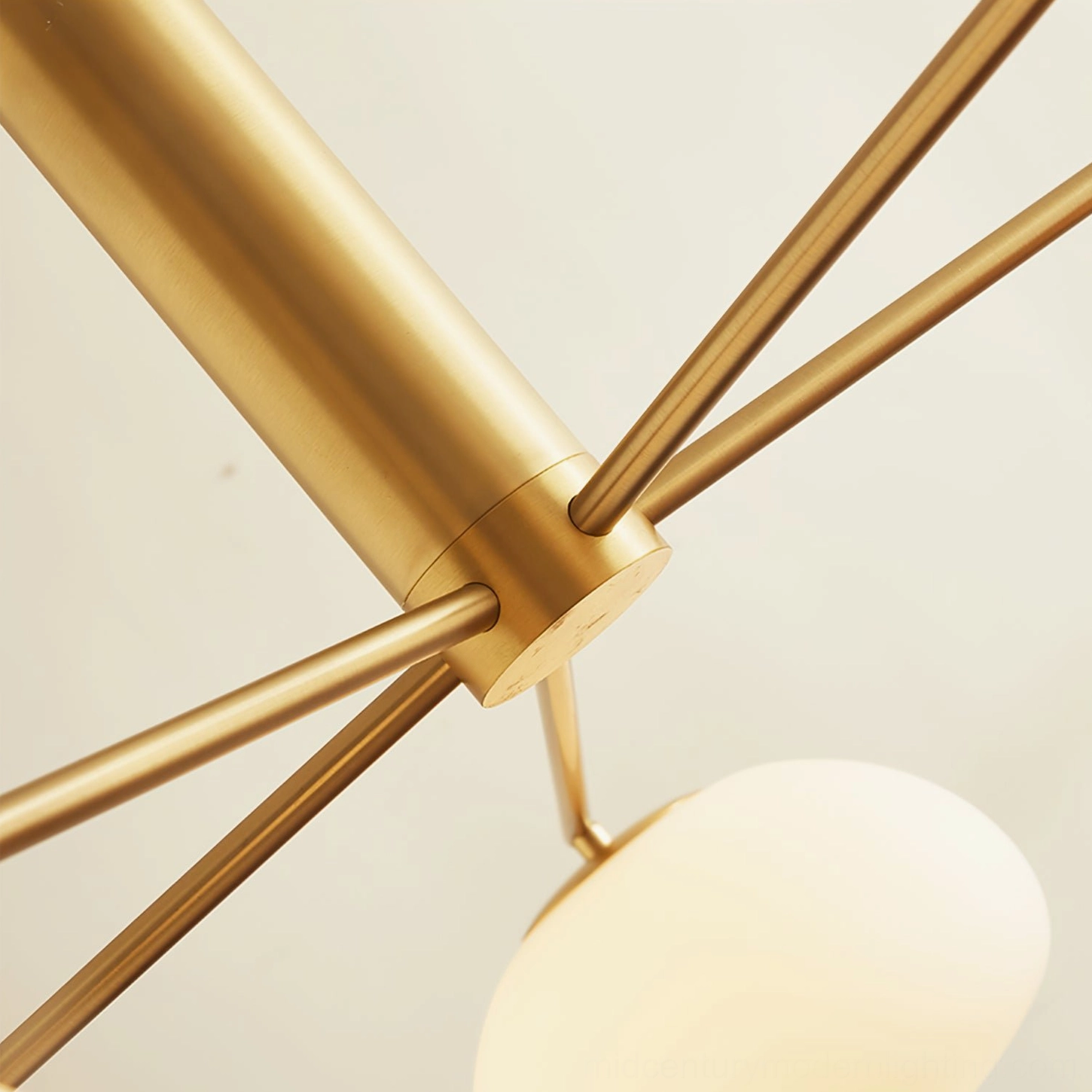Side view close-up of Briette sputnik chandelier multi-arm metal frame structure showing geometric brass gold design