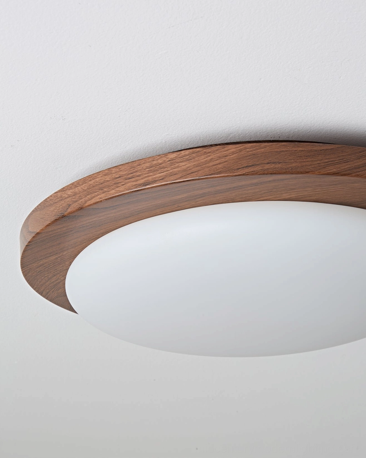 Bromo wood-framed ceiling light in hallway creating architectural interest and ambient warmth throughout space