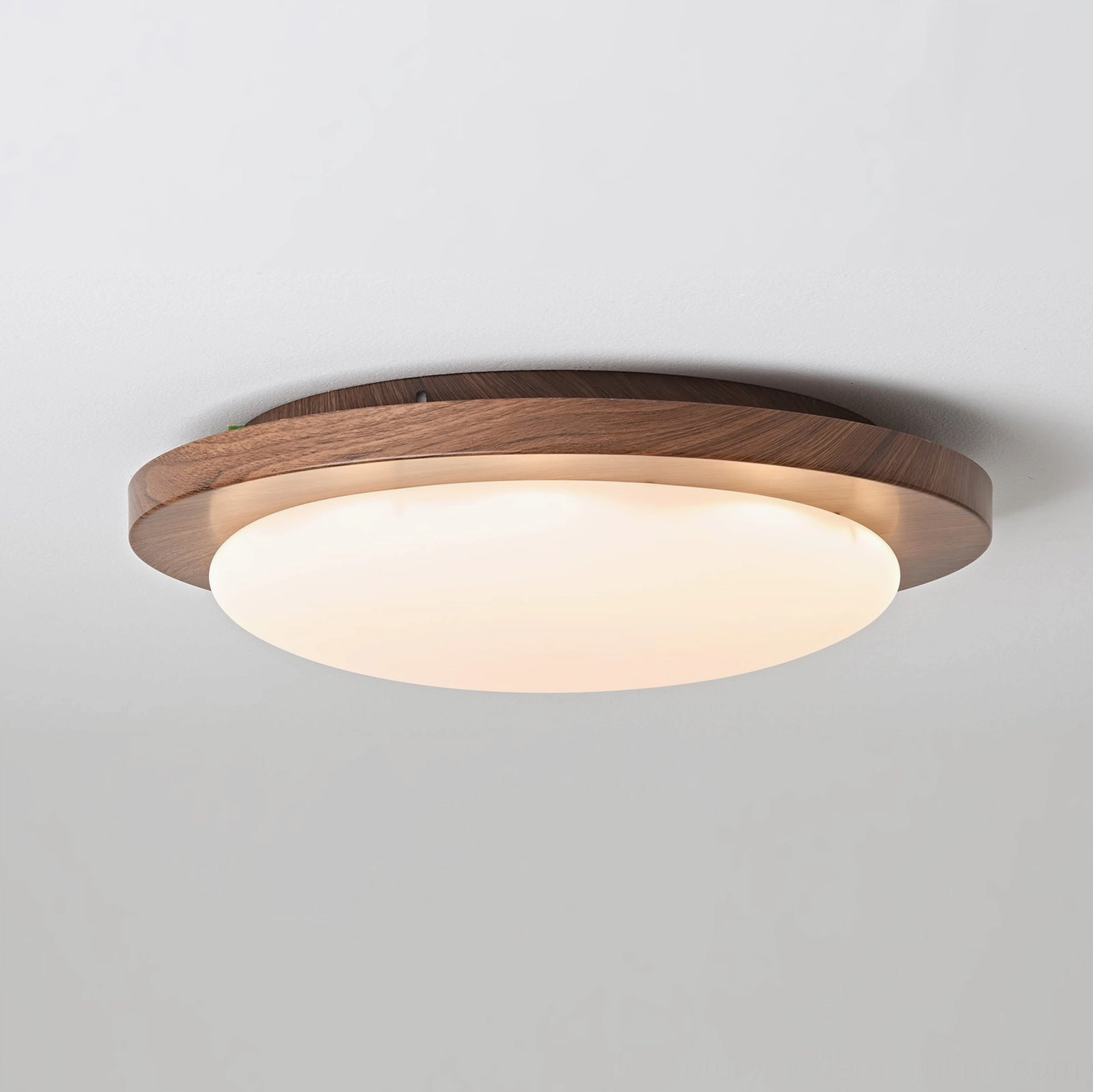 Bromo walnut flush mount ceiling light demonstrating even light distribution and frosted glass optical properties
