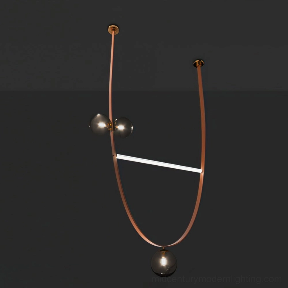 Brown leather strap pendant chandelier displaying natural leather patina and warm metalwork in mid-century modern style