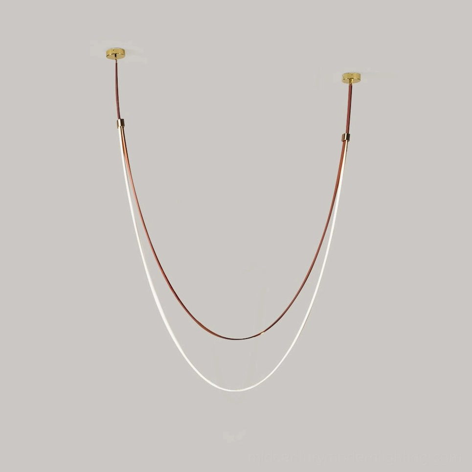 Brown leather pendant lamp demonstrating warm light color temperature and ambient lighting quality