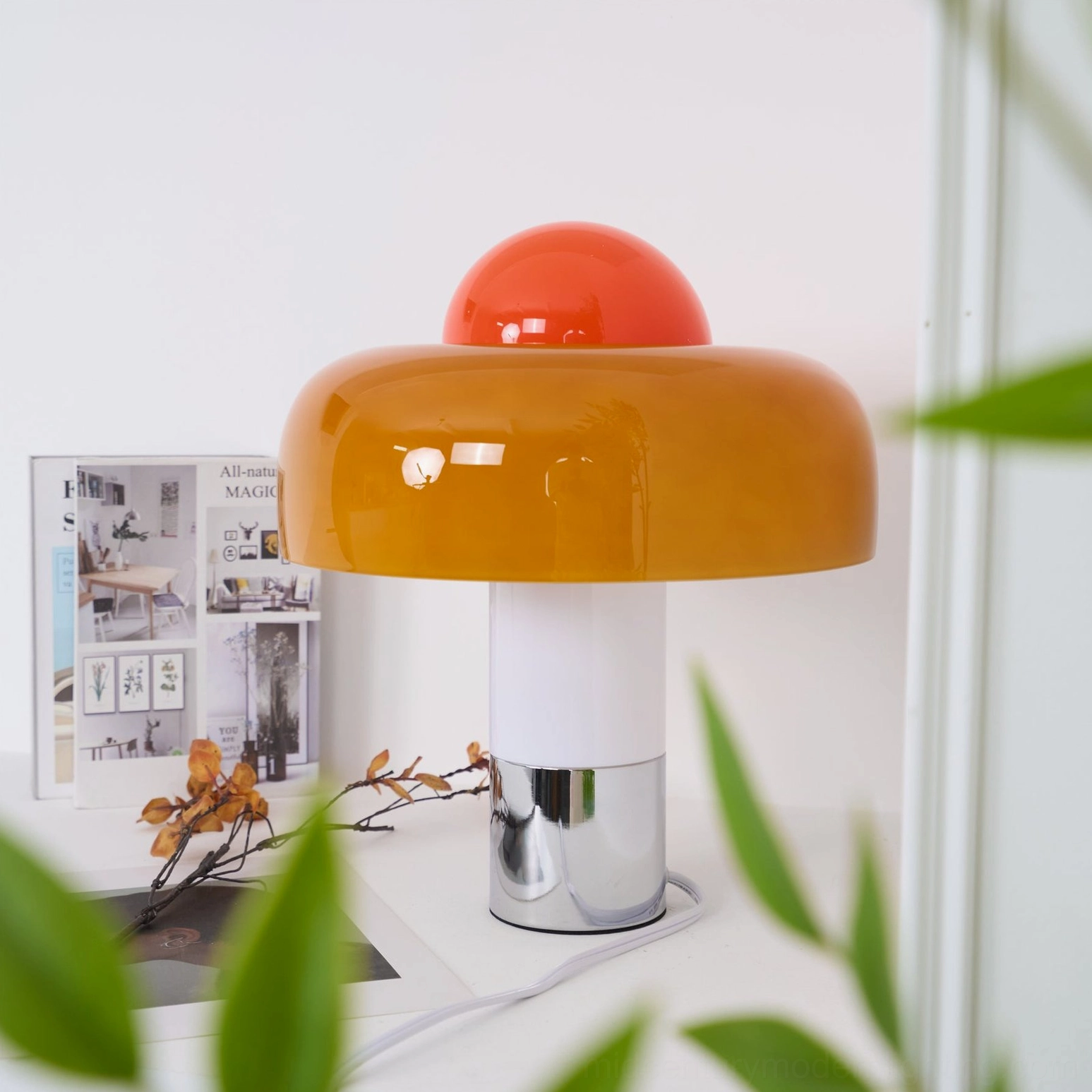 Brumbry mushroom lamp full silhouette with visible power cord on styled table with magazine and dried flowers
