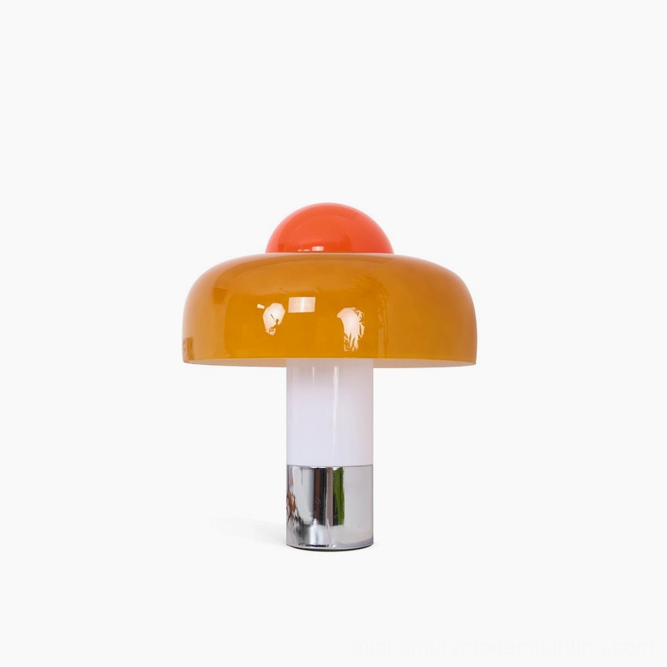 Brumbry table lamp product showcase featuring orange glass shade and polished chrome base design