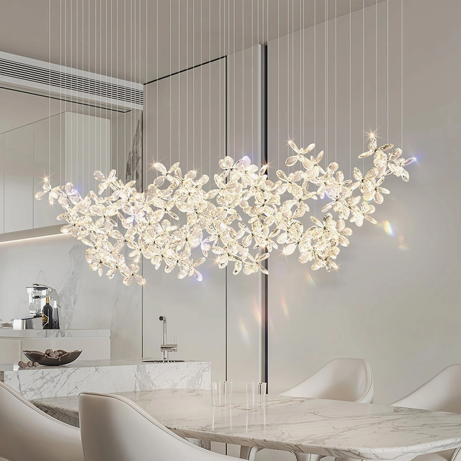 Butterfly crystal chandelier in contemporary minimalist white kitchen dining area, bright LED illumination, sleek silver metal canopy and hanging wires