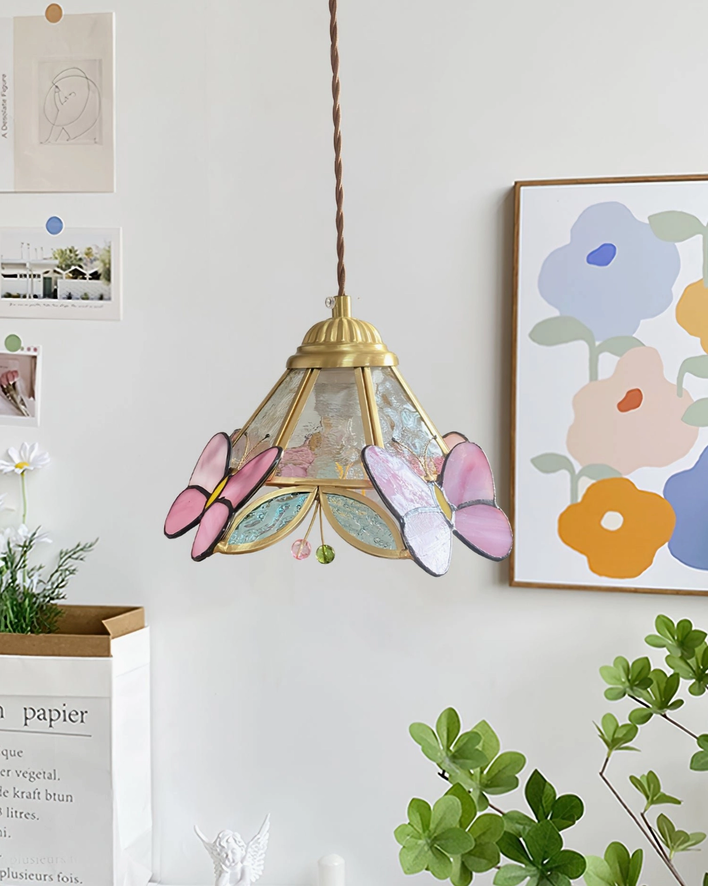 Lulla Butterfly Pendant Lamp Hanging in Cozy Living Space with Cottagecore Aesthetic