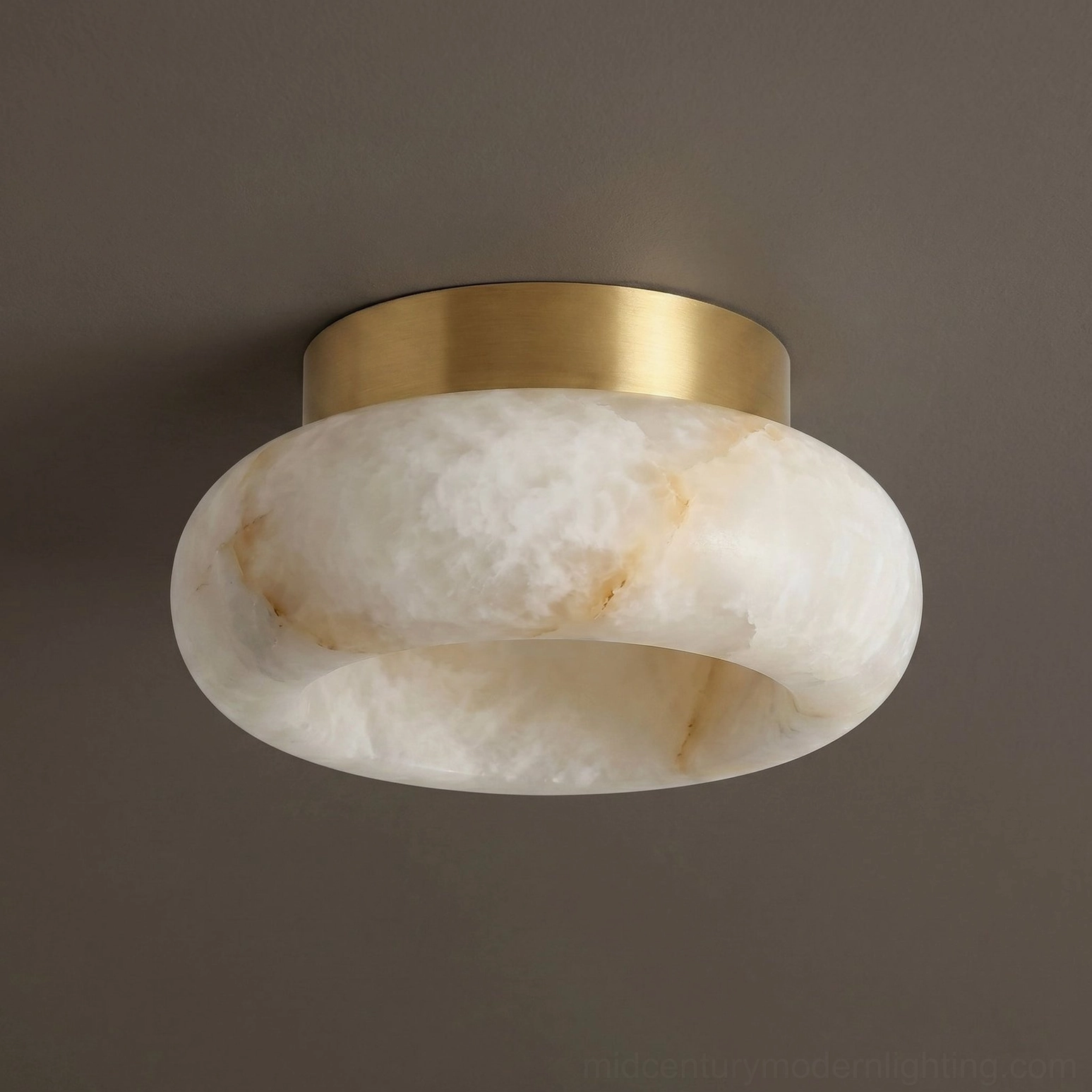 Close-up detail of Cairns alabaster ceiling lamp shade showing natural stone veining and warm stone translucency