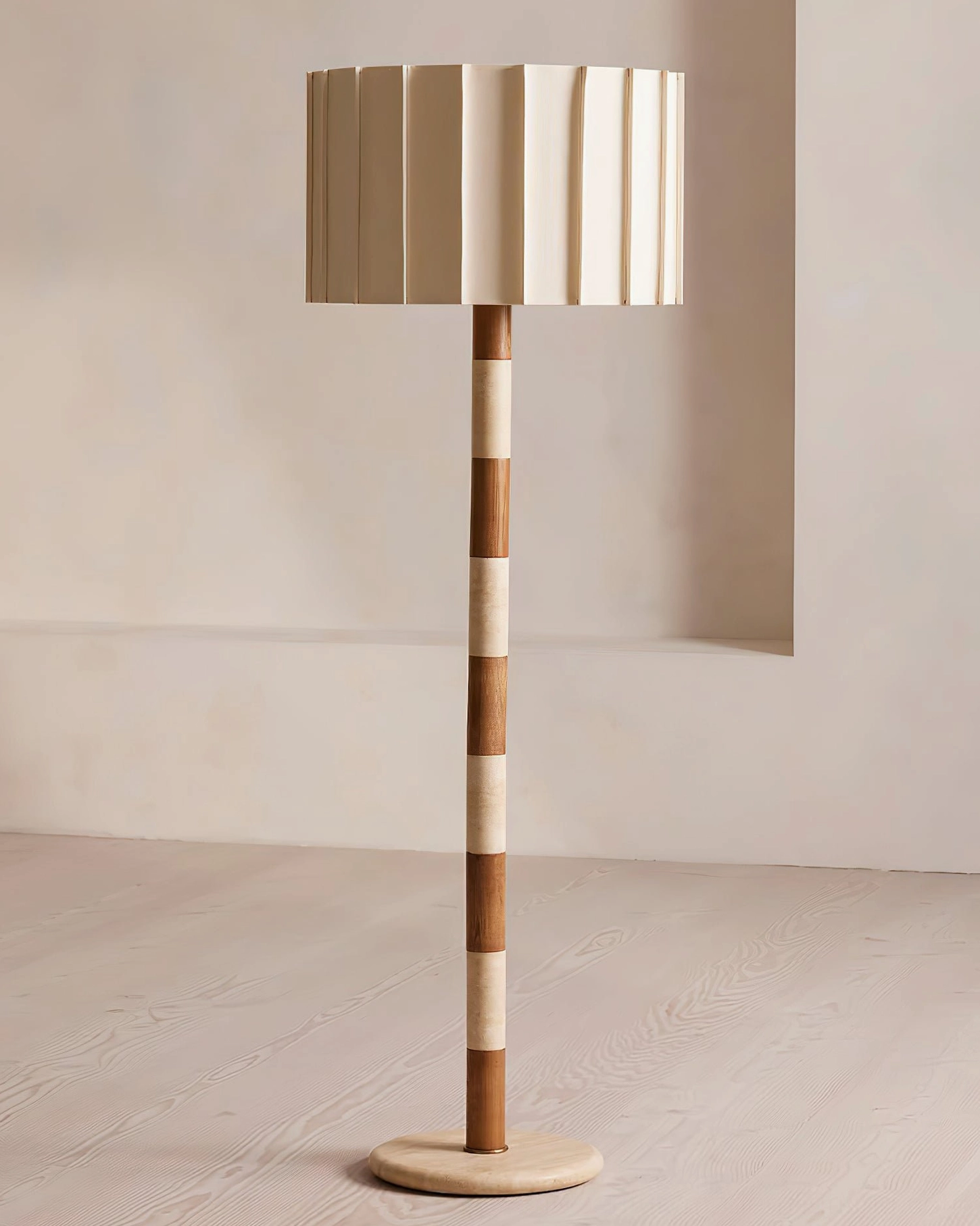 Calypso mid-century modern floor lamp in contemporary minimalist room setting, neutral walnut and beige palette