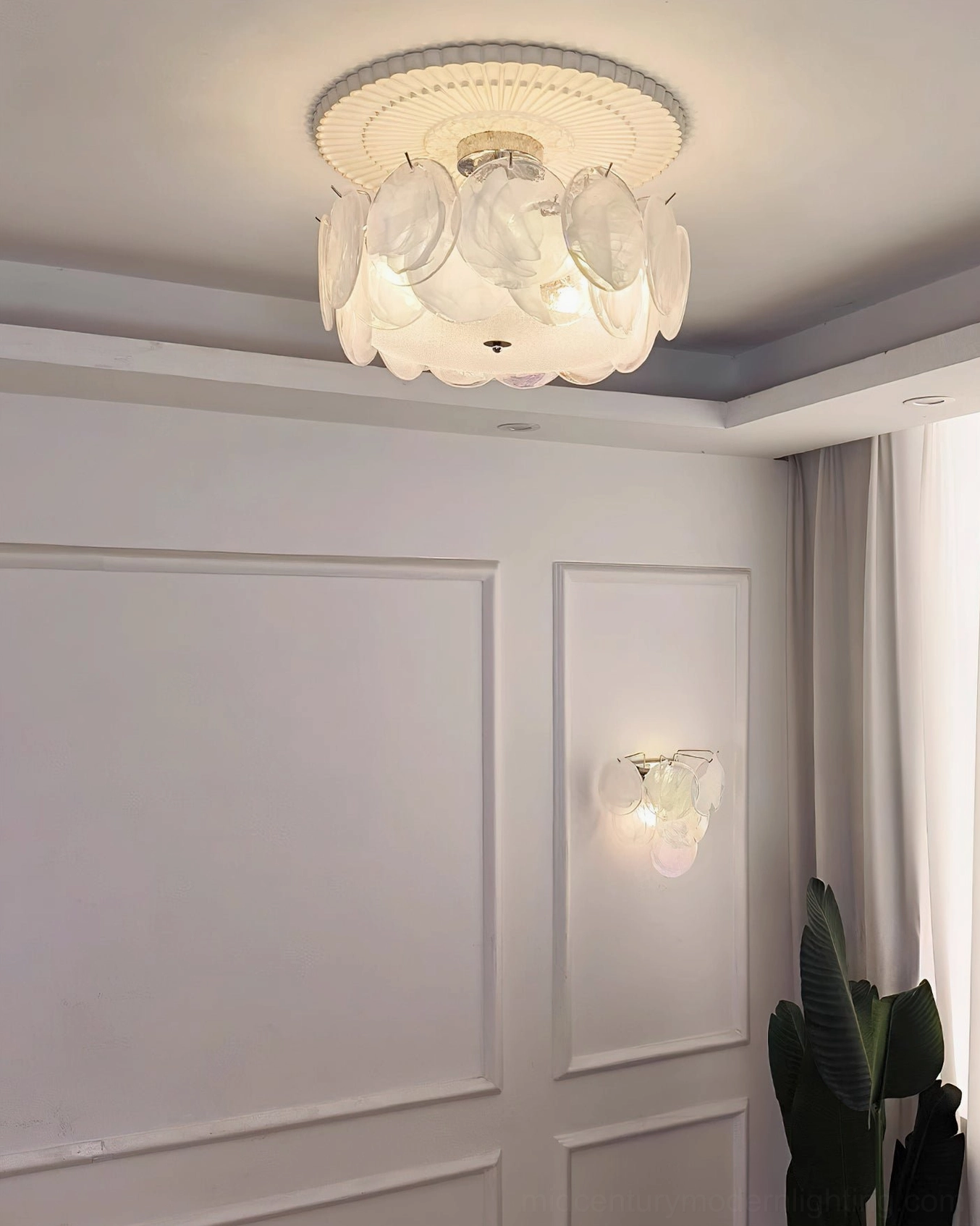 Camden glass ceiling light fixture showing multiple layered petal glass discs and chrome mounting hardware