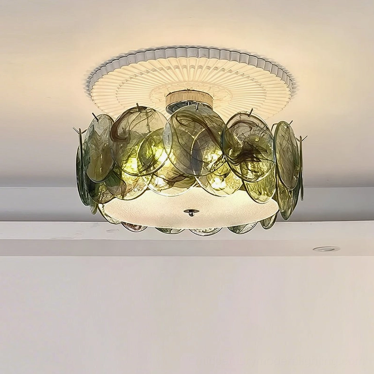 Green glass ceiling lamp with scalloped ceiling medallion, installed overhead view in bedroom