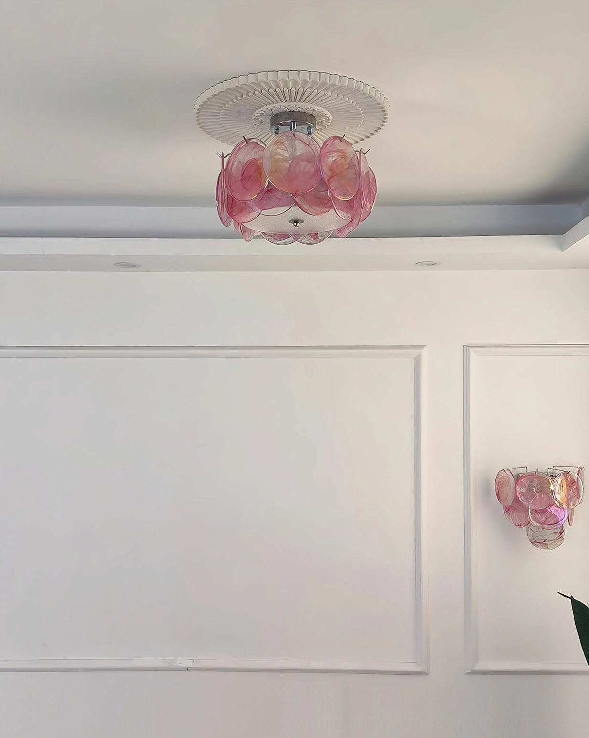 Glass ceiling lamp with hand-struck petal discs and chrome frame, overhead architectural view