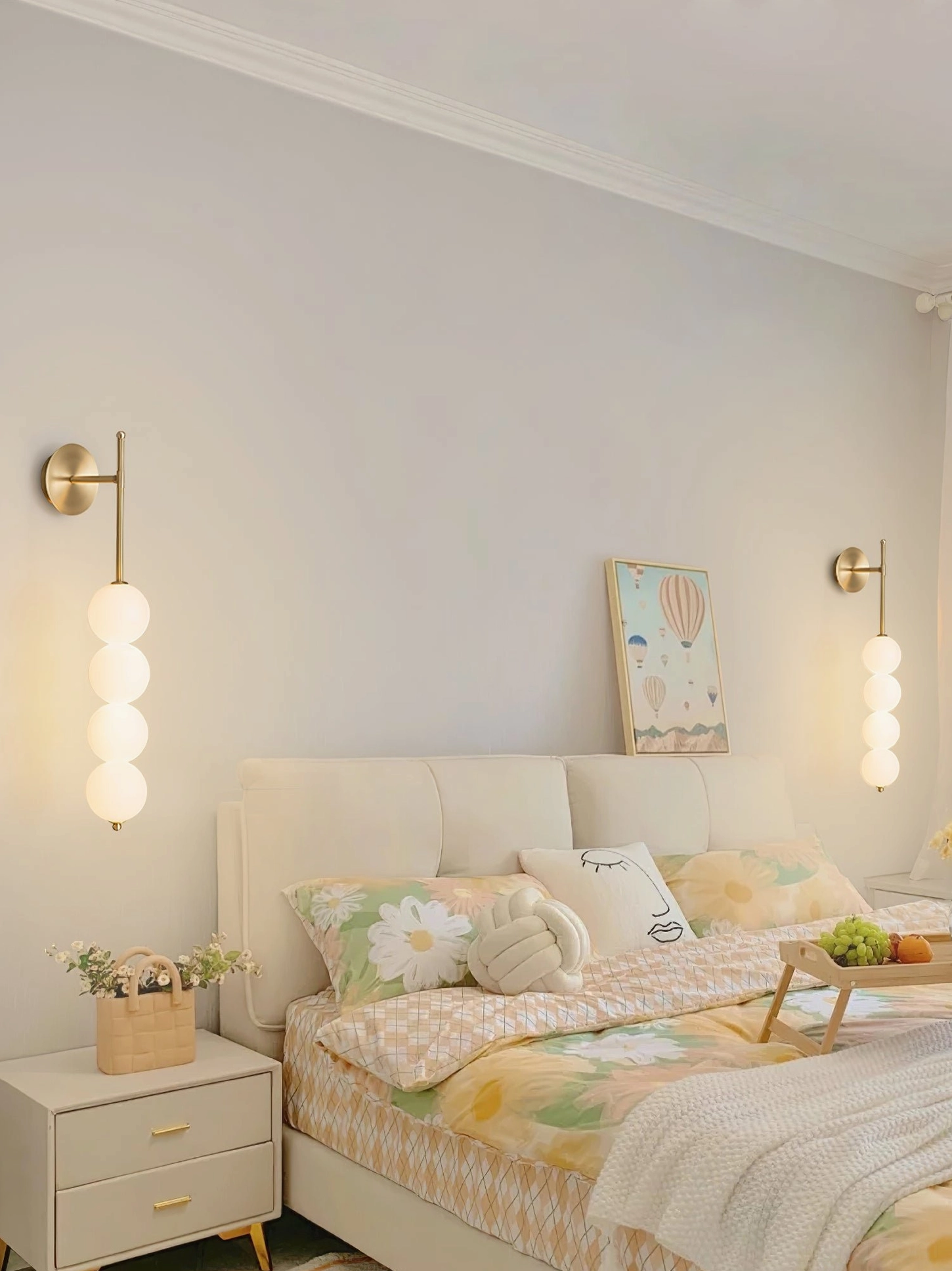 Candied Haws gold brass sconce with frosted glass globes showing product details and finish