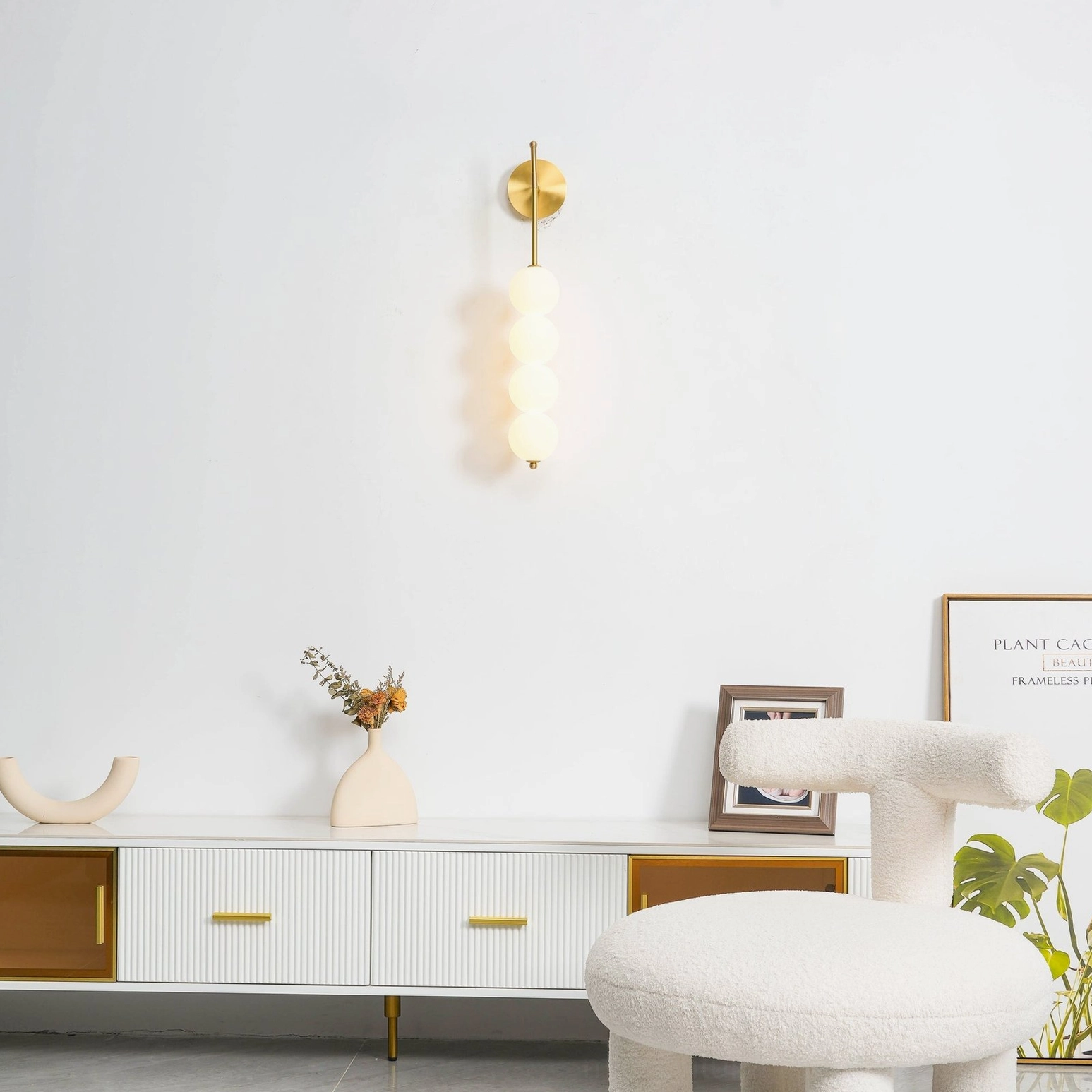 Candied Haws wall sconce multiple sconces gallery installation creating rhythmic lighting pattern